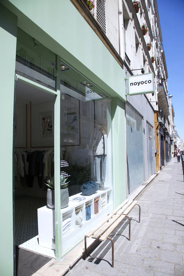 façade verte de la boutique noyoco au 9 rue commines à Paris